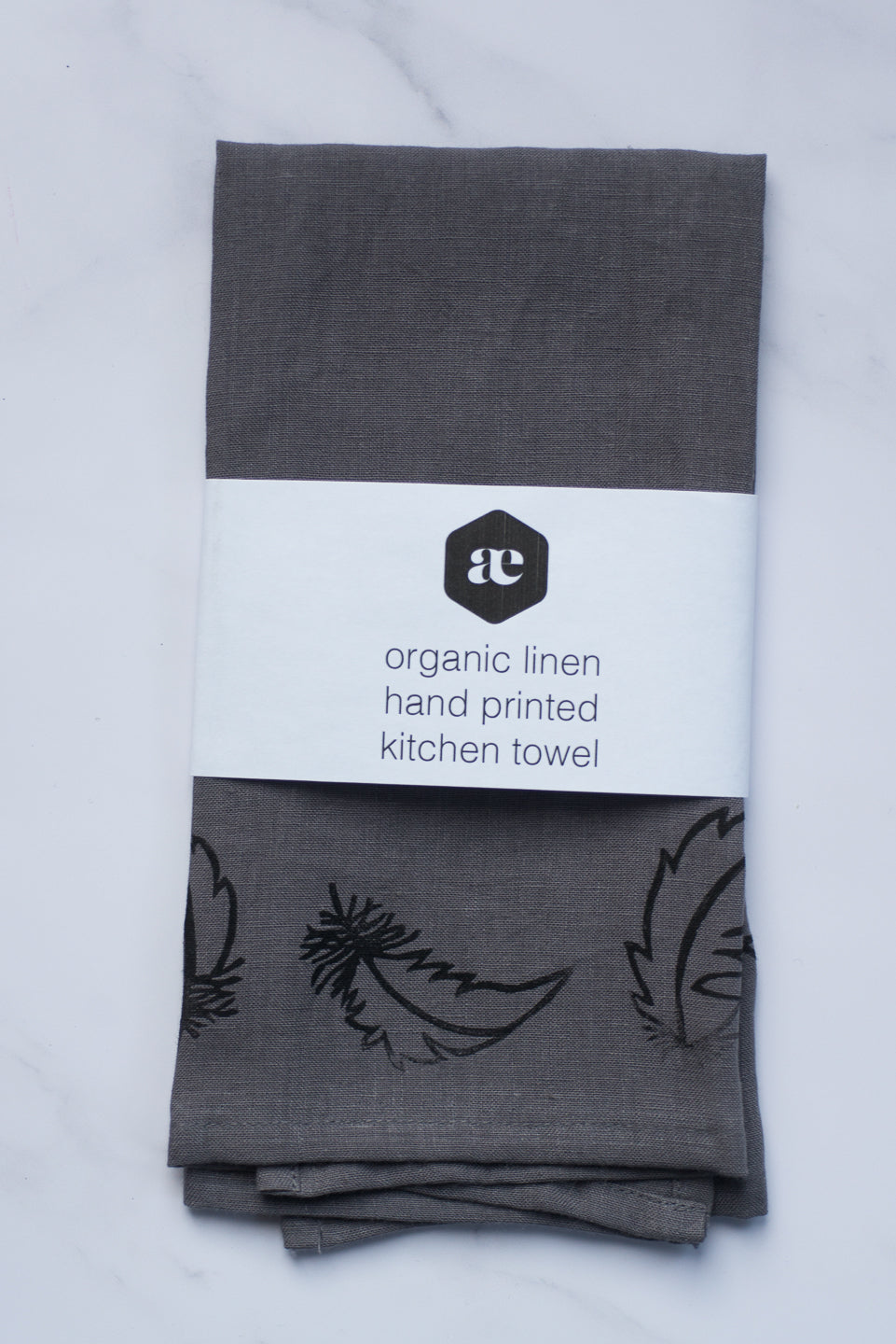 Organic linen tea towel - falling feathers