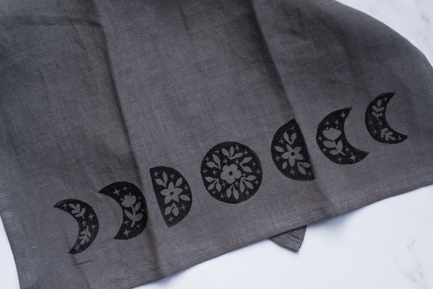 Organic linen tea towel - floral moons