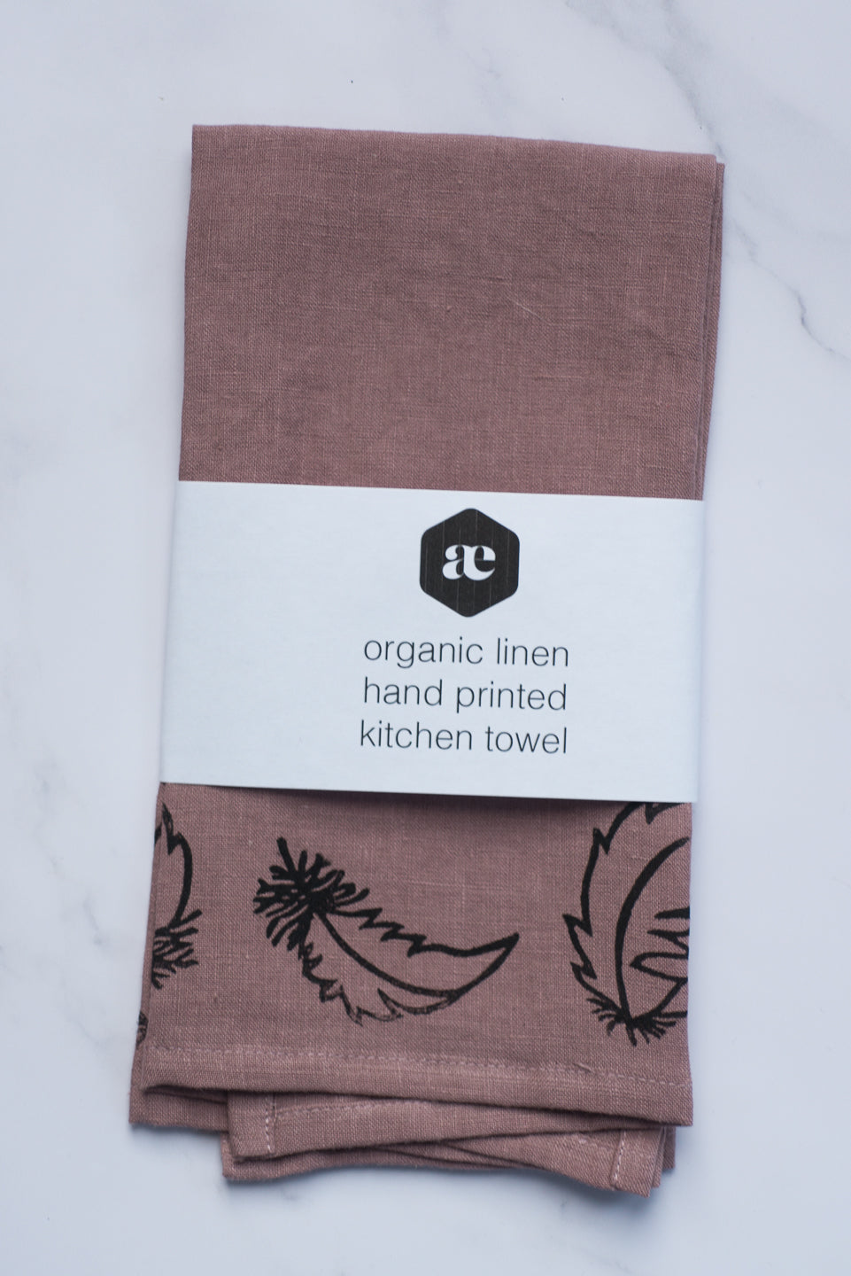 Organic linen tea towel - falling feathers