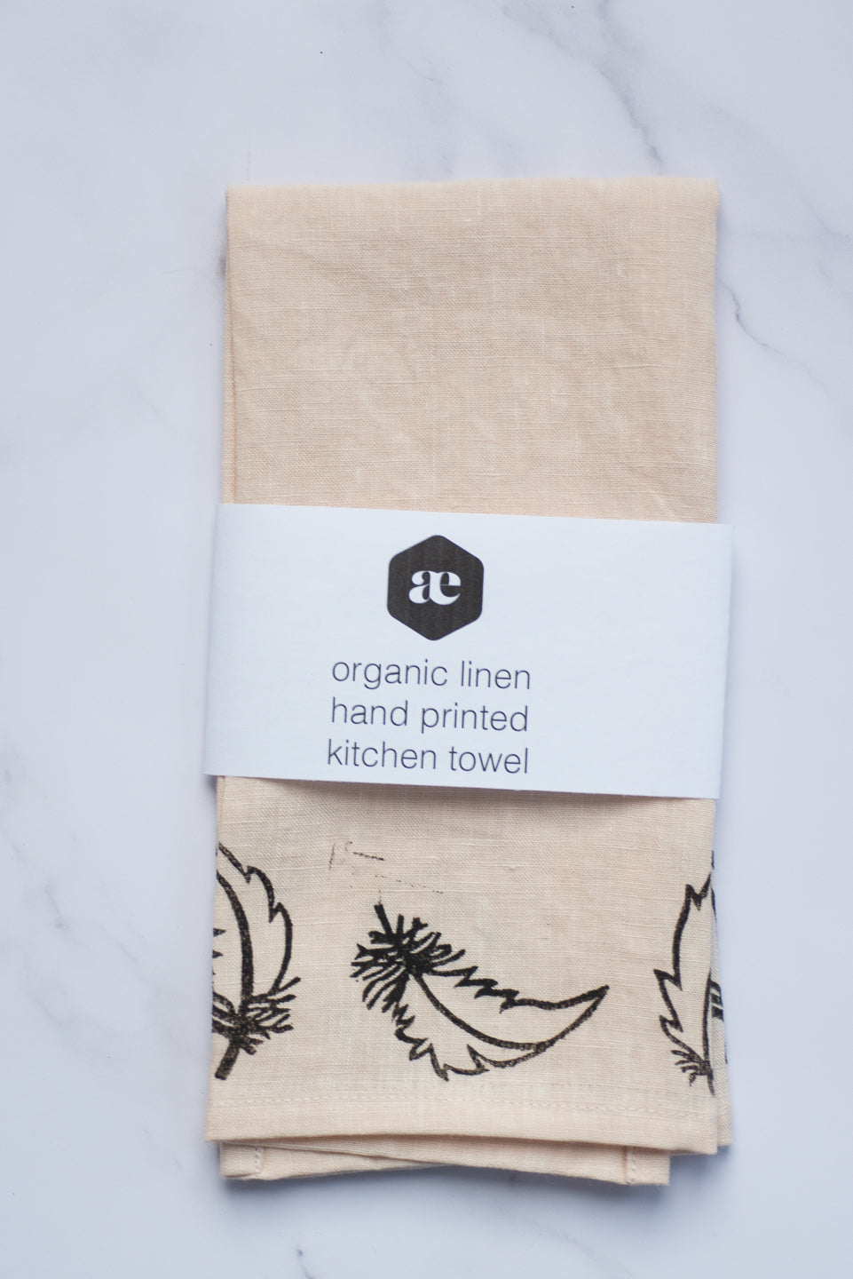 Organic linen tea towel - falling feathers